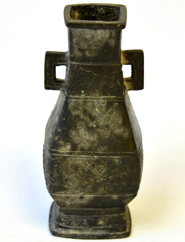 A Chinese Bronze Hu Vessel, Ming Dynasty: A Chinese Bronze Hu Vessel, Ming Dynasty, mounted with handles to the neck, the body squared bulbous body with key fret border, appx. 5 5/8 in. H.