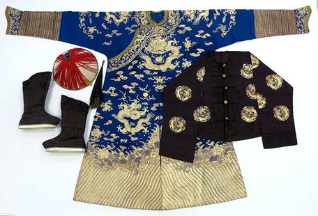 A Late Qing Chinese Official's Clothing Suite: A Late Qing Chinese Official's Clothing Suite, the suite contained in a custom leather wrapped trunk, including a Mandarin summer court hat with jade tassel suspending a one eyed peacock feather