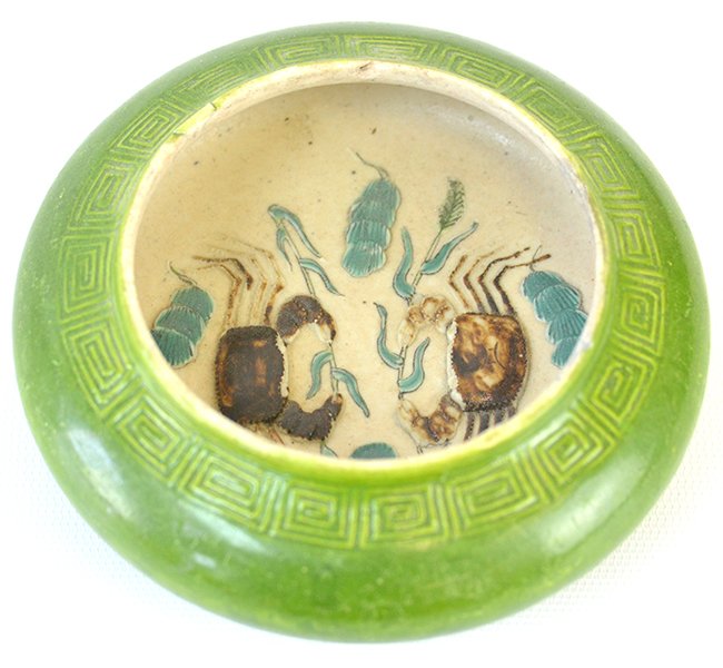 A Chinese Porcelain Brush Washer, Republic: A Chinese Porcelain Brush Washer, likely Republic Period, the green glazed brush washer with incised key fret border around the mouth, the inside carved in relief with a pair of crabs, with surface we