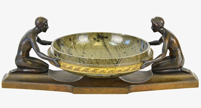 A French Art Deco Bronze and Marble Tazza: A French Art Deco Bronze and Marble Tazza, with a pair of kneeling bronze figures holding a marble bowl, the bowl with chips, appx. 16 1/4 in. W.