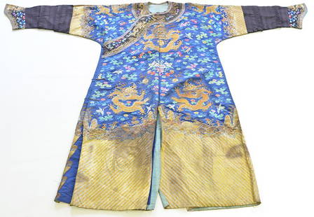 A 19th Century Chinese Dragon Robe: A 19th Century Chinese Dragon Robe, the garment embroidered with eight dragons chasing the flaming pearl, with auspicious symbols on a lingzhi diaper ground above a lishui stripe, with an additional c