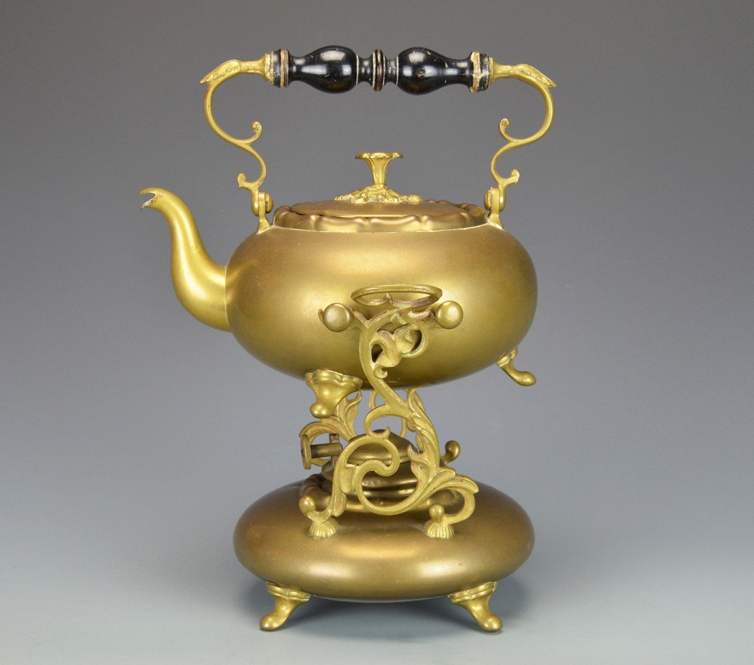 A Late Victorian Era Brass Teapot with Warmer