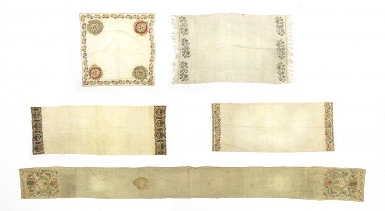 Five Embroidered Cotton and Silk Hand Towels: A Lot of Five Embroidered Cotton and Silk Hand Towels, Turkish, possibly Bursa, early 20th century, each towel embroidered with various threads including green, blue, purple, red, gold and silver, wit