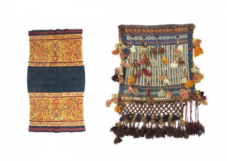 A Lot of Turkish and Persian Embroidered Wool Bags: A Lot of Turkish and Persian Embroidered Wool Bags, the Turkish bag, now a wall hanging, embroidered with red, green, yellow and beige wool on a blue ground, the Persian bag, possibly 20th century Afg