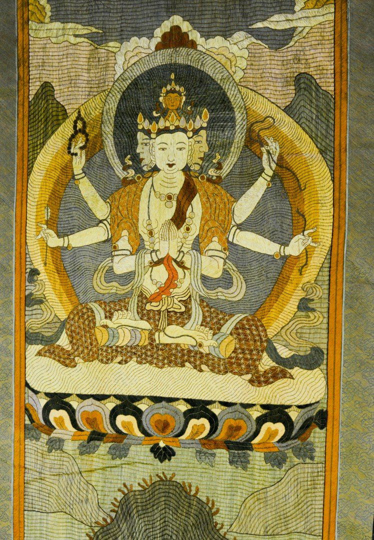 A Tibetan Woven Thangka of Phra Phrom (1 of 3)