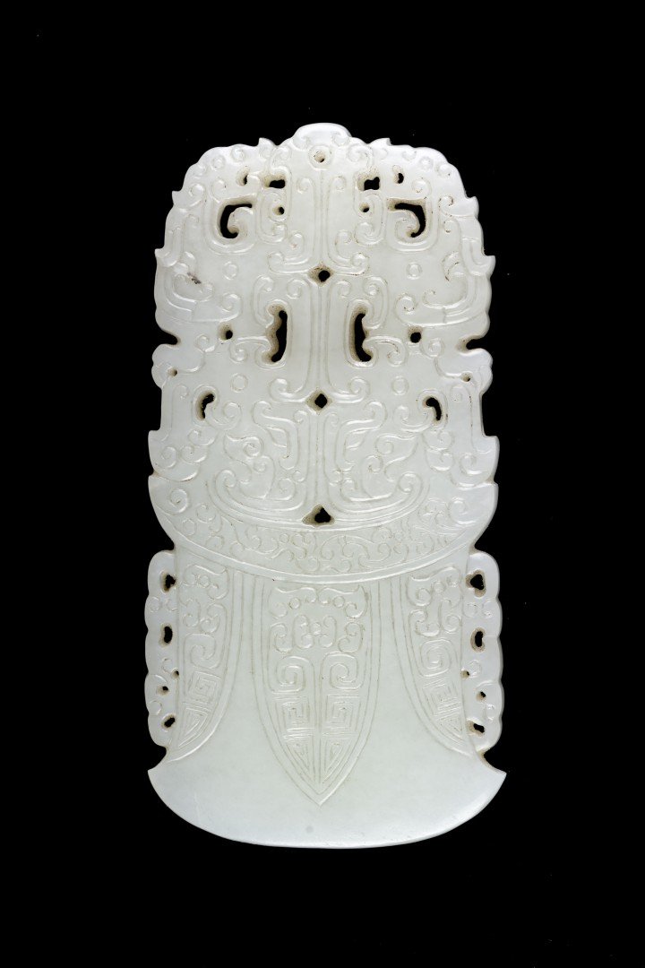A Chinese White Jade Pendant in form of Axe Head (1 of 2)