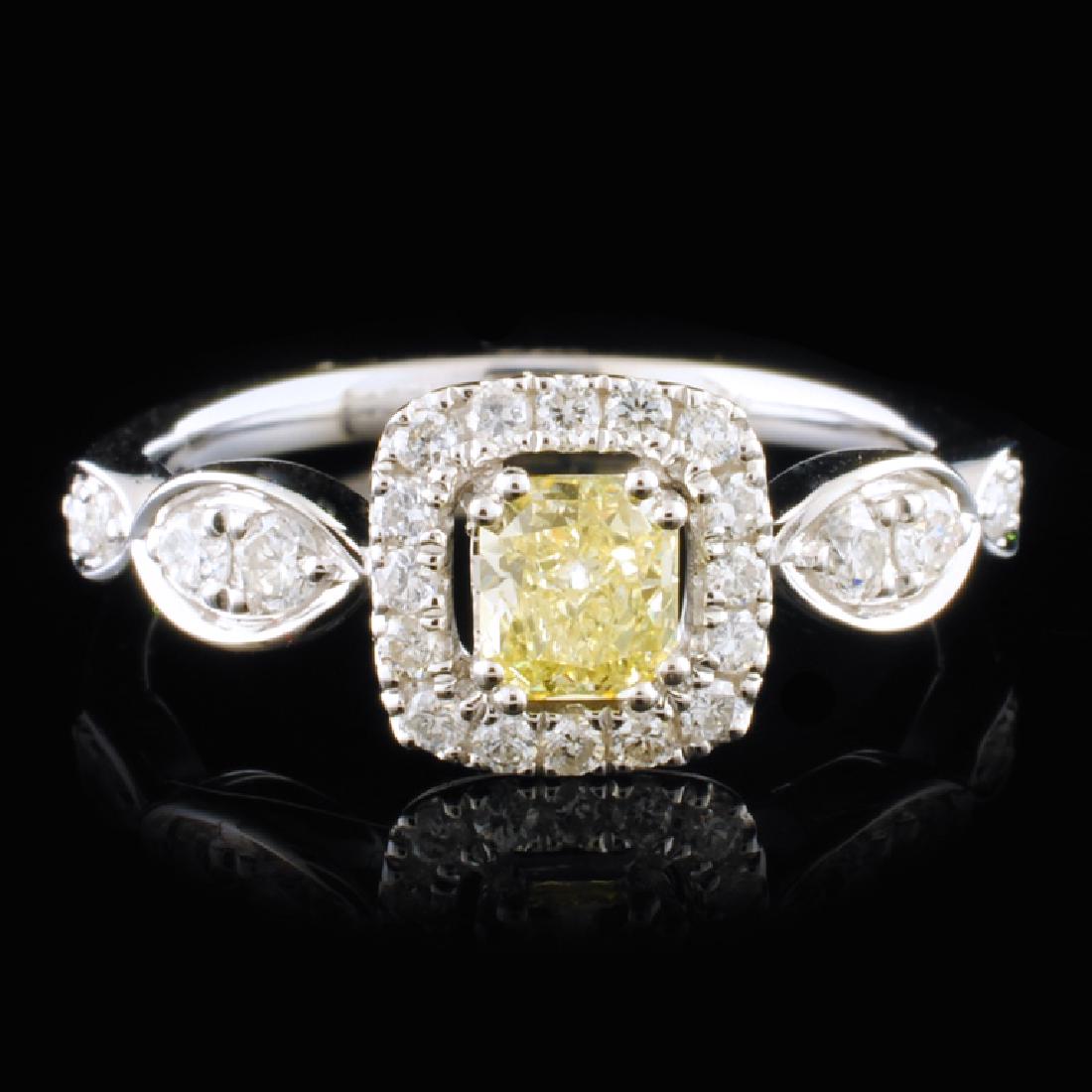 18K White Gold 0.64ctw Fancy Yellow Diamond Ring: Estimated Retail Replacement Value: $5,152.00 Ref: WAG2944 Item no.: FA2058559005-R7061A Gold Content: 18K White Gold Weight of Item: 2.60 grams Size:Ã‚Â 7 Main Gemstone: Natural Fancy Yellow Dia