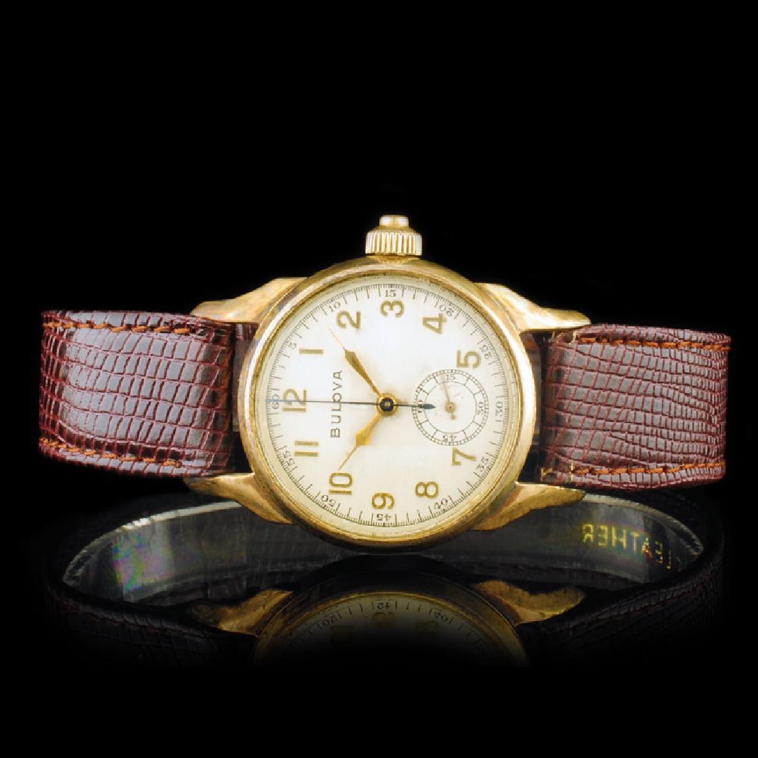 BULOVA 18K Gold Chrono 31mm Wristwatch: Estimated Retail Replacement Value: $6,900.00Ref: WAG9200Item No.: ARXAB004Specification:Model: BULOVA Movement: Manual Wind Function: ChronometerCase Size: 31mmCase Material: 18K Yellow Gold Bracelet