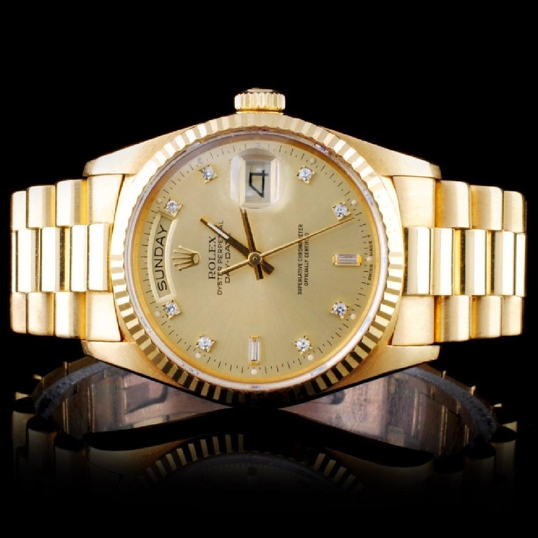 Rolex 18K DayDate Men's Diamond Wristwatch: Estimated Retail Replacement Value: $38,500.00Ref: WAG44000Item no.: ARXD012Specification:Model: Oyster Perpetual Day-DateMovement: Perpetual, Self WindingCase Material: 18K Yellow GoldBracelet Materi