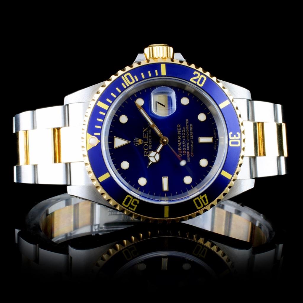 Rolex Submariner 18K & Stainless Steel Watch: Estimated Retail Replacement Value: $31,500.00 Ref: IRA30000 Item No.: ARXU-010 Specification: Model: Submariner Movement: Perpetual, Self Winding Function: Quickset Date Case Size: 40mm Case Material