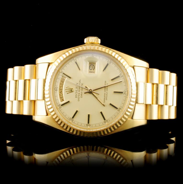 Rolex Day-Date 18K YG 36MM Wristwatch: Estimated Retail Replacement Value: $29,875.00 Ref: BAS42000 Item no.: ARXAA-0028 Specification: Model: Oyster Perpetual Day-Date Movement: Perpetual, Self Winding Case Material: 18K Yellow Gold Case 