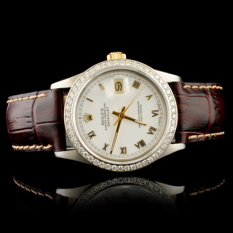 Rolex DateJust YG/SS 1.35ct Diamond 36MM Watch: Ref: WAG14000 Specification: Model: DateJust Movement: Perpetual, Self Winding Function: Instantaneous Quick Set Date Case Size: 36mm Case Material: Stainless Steel Bracelet Materials: Leather Bracele