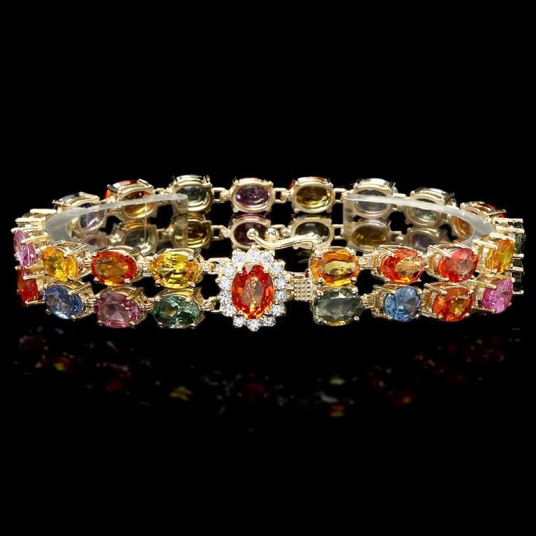 `14k Gold 35.00ct Sapphire & 0.50ct Diamond Bracel: Estimated Retail Replacement Value: $28,800.00 Ref: WA10200 Item No.: ARA-CRA112 Metal: 14k Solid Yellow Gold Size: 7 Total Item Weight: 25.00 grams Country Made: USA Main Stone: Sapphire Color: Multi
