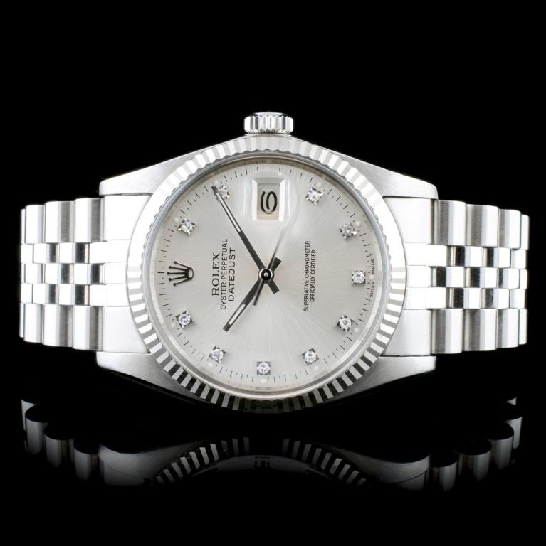 Rolex DateJust 18K/SS Diamond 36mm Wristwatch: Estimated Retail Replacement Value: $13,500.00Ref: IRA14000Item No.: ARXU-050Specification:Model: DateJust OysterMovement: Perpetual, Self WindingFunction: DateCase Size: 36mmCase Material: Stainless
