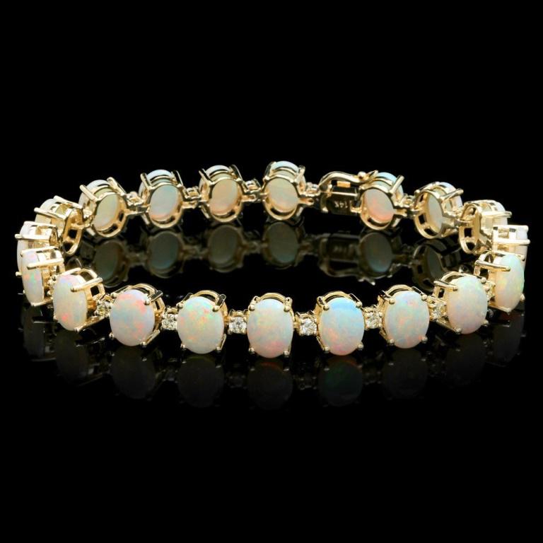 `14k Gold 18.00ct Opal & 1.45ct Diamond Bracelet: Estimated Retail Replacement Value: $21,300.00 Ref: WAG9100 Item No.: ARA-CRA085 Metal: 14k Solid Yellow Gold Size: 7.5 Total Item Weight: 20.00 grams Country Made: USA Main Stone: Opal Color: Multi-C