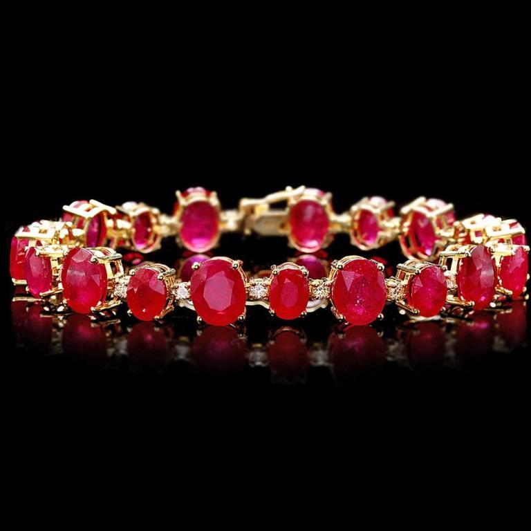 `14k Gold 50.00ct Ruby & 1.50ct Diamond Bracelet: Estimated Retail Replacement Value: $34,000.00 Ref: WAG11800 Item No.: ARA-CRA124 Metal: 14k Solid Yellow Gold Size: 7.5 Total Item Weight: 28.00 grams Country Made: USA Main Stone: Ruby Color: Red Ca