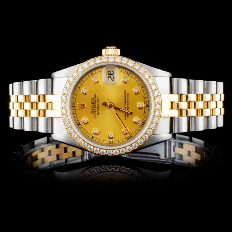 Rolex DateJust YG/SS Diamond 36mm Watch: Estimated Retail Replacement Value: $22,500.00Ref: WAG18000Item No.: ARXI010Specification:Model: DateJust Oyster PerpetualMovement: Perpetual, Self WindingFunction: Instantaneous DateCase Size: 36mmCa
