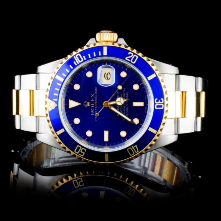 Rolex YG/SS Submariner 40MM Wristwatch: Estimated Retail Replacement Value: $7,950.00Ref: WAG28800Item no.: ARXE001Specification:Model: Submariner Rolex WatchMovement: Perpetual, Self-winding, 31- Jewel Mechanical ChronometerCase Material: