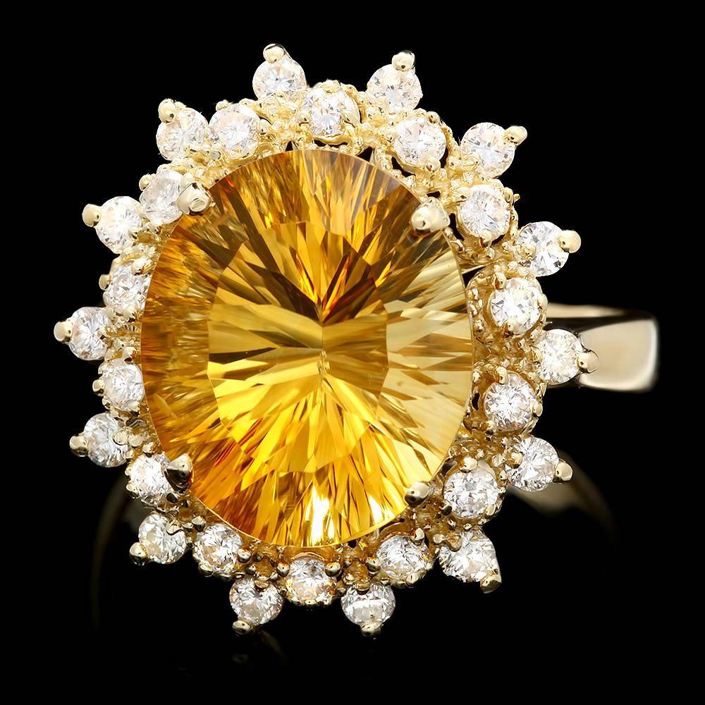 14k Gold 5ct Citrine 0.75ct Diamond Ring: This luxurious ladies ring is crafted in solid 14k Yellow Gold and features a 5.00 carat 100% Natural Citrine mined from Brazil + accented with 28 sparkling eye-clean natural Diamonds, totaling 0.75 c