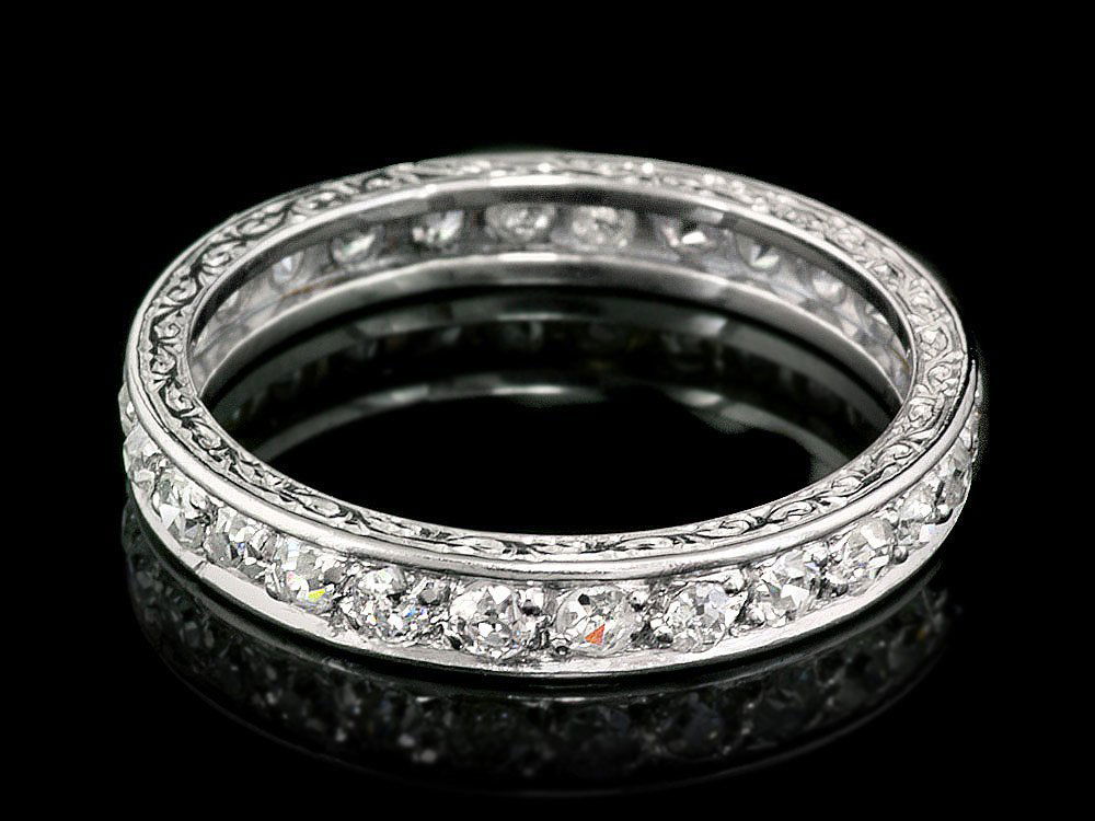 Antique Platinum 0.88ct Diamond Wedding Ring Band: This lovely ladies ring is crafted in solid Platinum and features 28 (0.88 ctw) 100% Natural Diamonds. . Excellent craftsmanship. Made in USA. 4800a Retail: $5,100.00