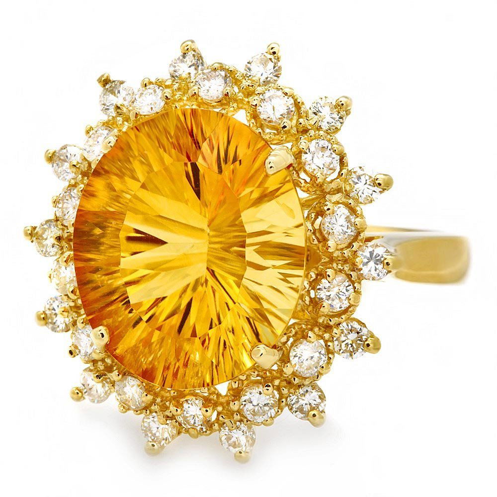 14k Gold 5ct Citrine 0.75ct Diamond Ring: This luxurious ladies ring is crafted in solid 14k Yellow Gold and features a 5.00 carat 100% Natural Citrine mined from Brazil + accented with 28 sparkling eye-clean natural Diamonds, totaling 0.75 c