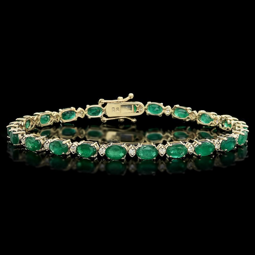 14k Gold 10ct Emerald 0.50ct Diamond Bracelet: This stunning ladies bracelet is crafted in solid 14k White Gold and features 21 (10.00 ctw) 100% Natural Emeralds mined from Colombia + accented with 21 sparkling eye-clean natural Diamonds, totaling