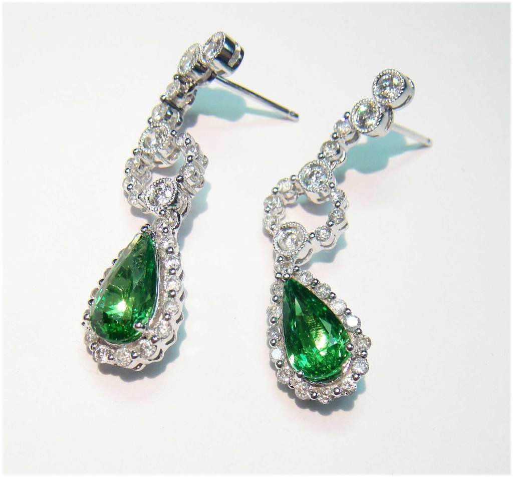 18KT Gold, 3.60ct Tsavorite & 1.28ct Diamond Earrings: 18KT White Gold, NATURAL 3.60ct Pear Cut Tsavorite Garnet & 1.28ctw Round Brilliant Cut (VS2-I1 Color H-I) Diamond Dangle Earrings. Total Weight of Earrings: N80R00 7 grams.