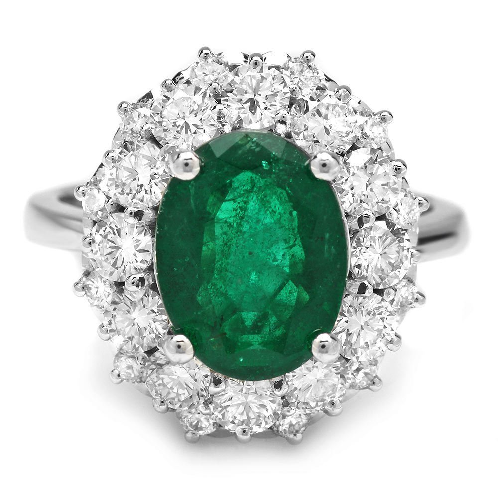 14kT White Gold 3.20ct Emerald 1.80ct Diamond Ring: This lovely ladies ring is crafted in solid 14k White Gold and features a 3.20 carat 100% Natural Emerald mined from Colombia + accented with 24 sparkling eye-clean natural Diamonds, totaling 1.80 car