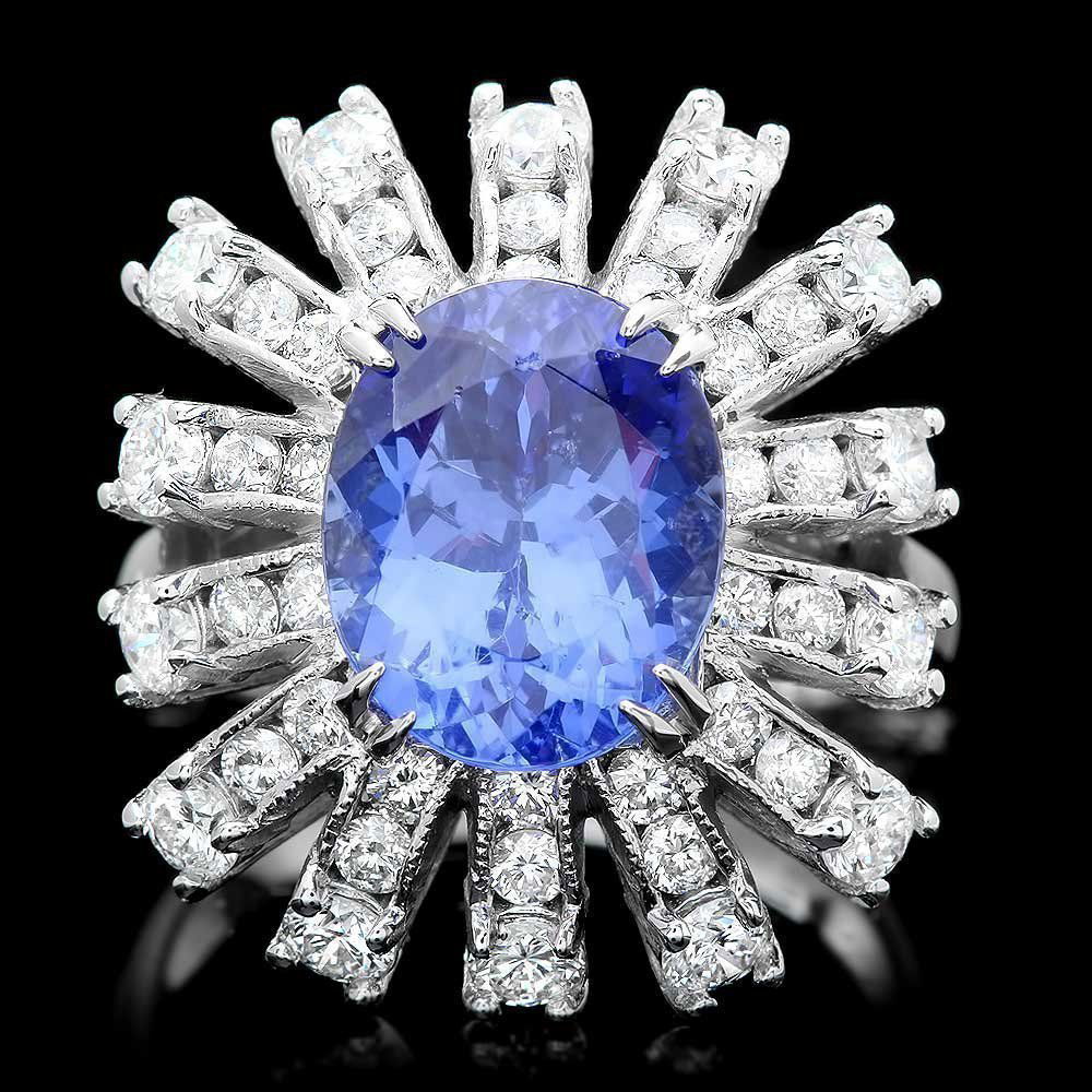 14k Gold 5ct Tanzanite 1.70ct Diamond Ring: This elegant ladies ring is crafted in solid 14k White Gold and features a 5.00 carat 100% Natural Tanzanite mined from Tanzania + accented with 42 sparkling eye-clean natural Diamonds, totaling 1.70