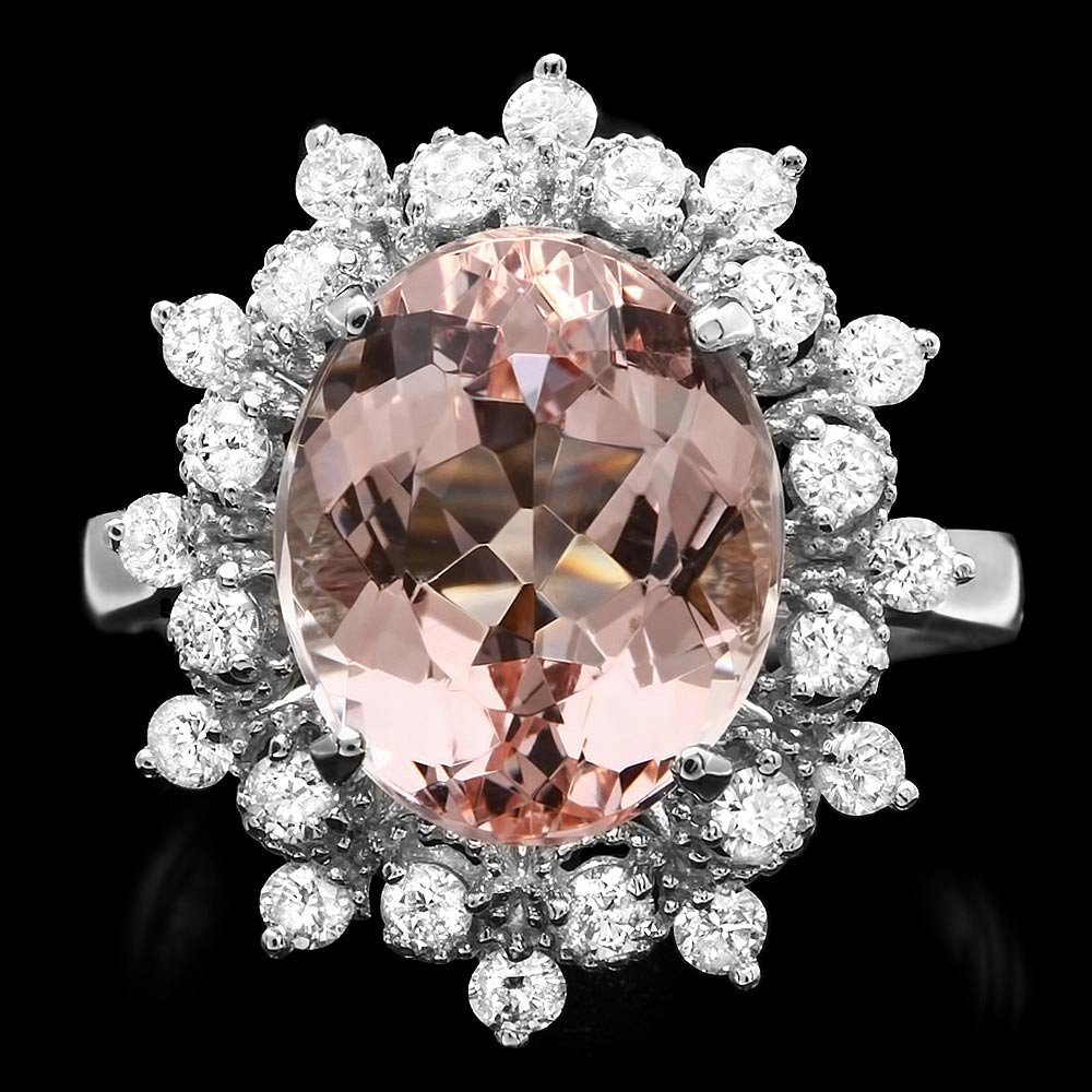 14k Gold 5ct Morganite 0.70ct Diamond Ring: This lovely ladies ring is crafted in solid 14k White Gold and features a 5.00 carat 100% Natural Morganite mined from Brazil + accented with 24 sparkling eye-clean natural diamonds, totaling 0.70 car