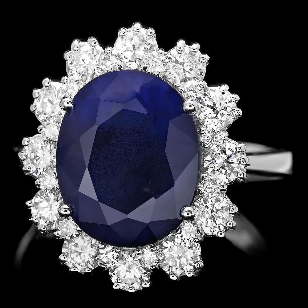 14k Gold 5ct Sapphire 1.25ct Diamond Ring: This magnificent ladies ring is crafted in solid 14k White Gold and features a 5.00 carat Natural Sapphire mined from Sri Lanka + accented with 24 sparkling eye-clean natural Diamonds, totaling 1.25 c