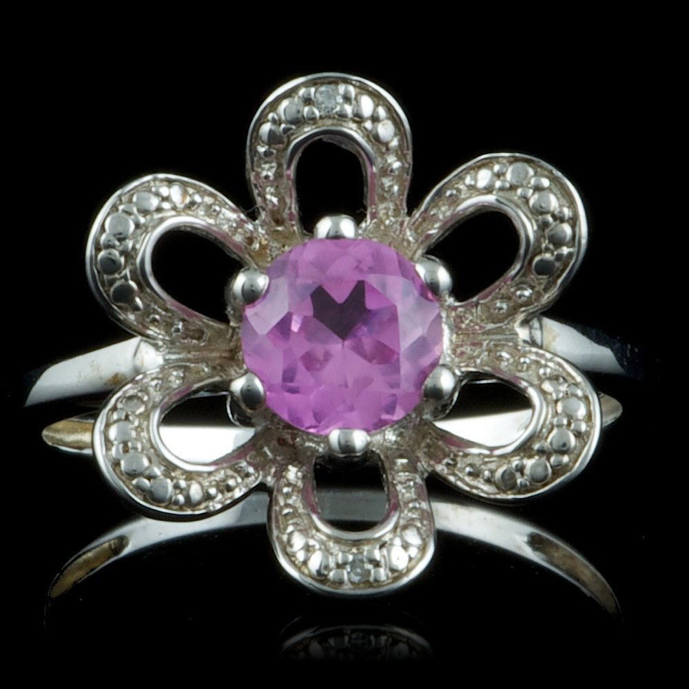 925 Sterling Silver 0.50ct Amethyst Diamond Ring: Retail: $100.00 Metal: .925, Sterling Silver Size: 7 Total Item Weight: 3.0 grams Main Stone: Amethyst Color: Purple Carat Total Weight: 0.50 Treatment: None Clarity: Type 2 Cut: Very Good Secondary S