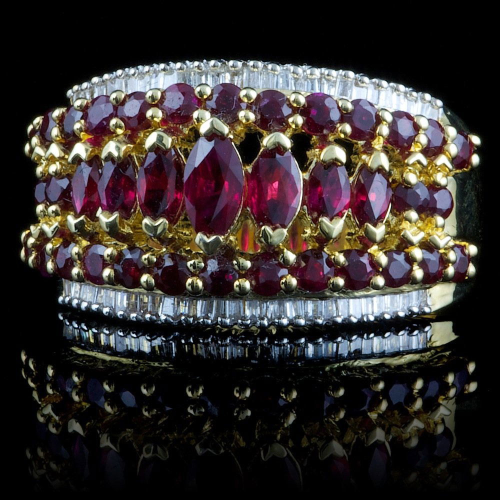 925 Sterling Silver 2ct Ruby 0.25ct Diamond Ring: Retail: $300.00 Metal: .925, Sterling Silver Size: 7.25 Total Item Weight: 8.9 grams Main Stone: Ruby Color: Red Carat Total Weight: 2.00 Treatment: Created Clarity: Type 2 Cut: Very Good Secondary St