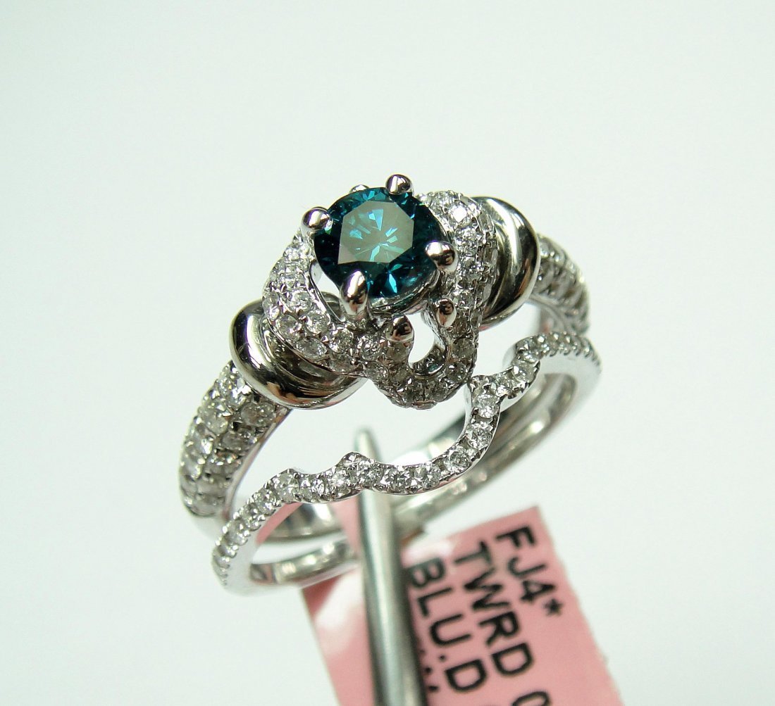 14Kt Gold, 0.45ct Blue & 0.76ct White Diamond Ring.: 14KT Gold, 0.45ct Blue & 0.76ct White Diamond Ring. Certificate of appraisal is included. A3240N