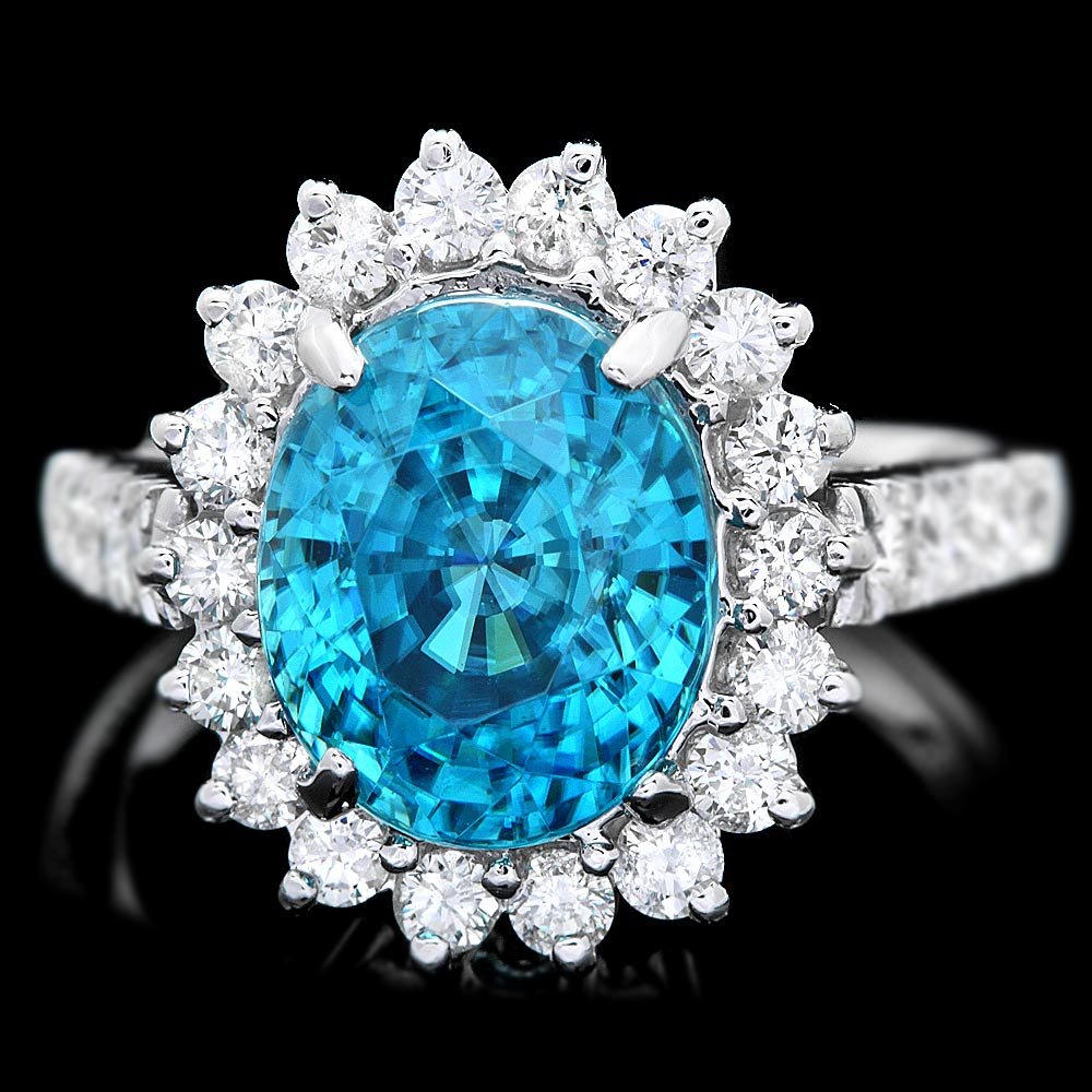 14k White Gold 6.00ct Zircon 0.85ct Diamond Ring: 14k White Gold 6.00ct Zircon 0.85ct Diamond Ring ****** Metal: 14k Solid White Gold / Size: 6.5 / Total Item Weight: 5.5 grams / Country Made: USA / / Main Stone: Zircon / Color: Blue / Carat Total We