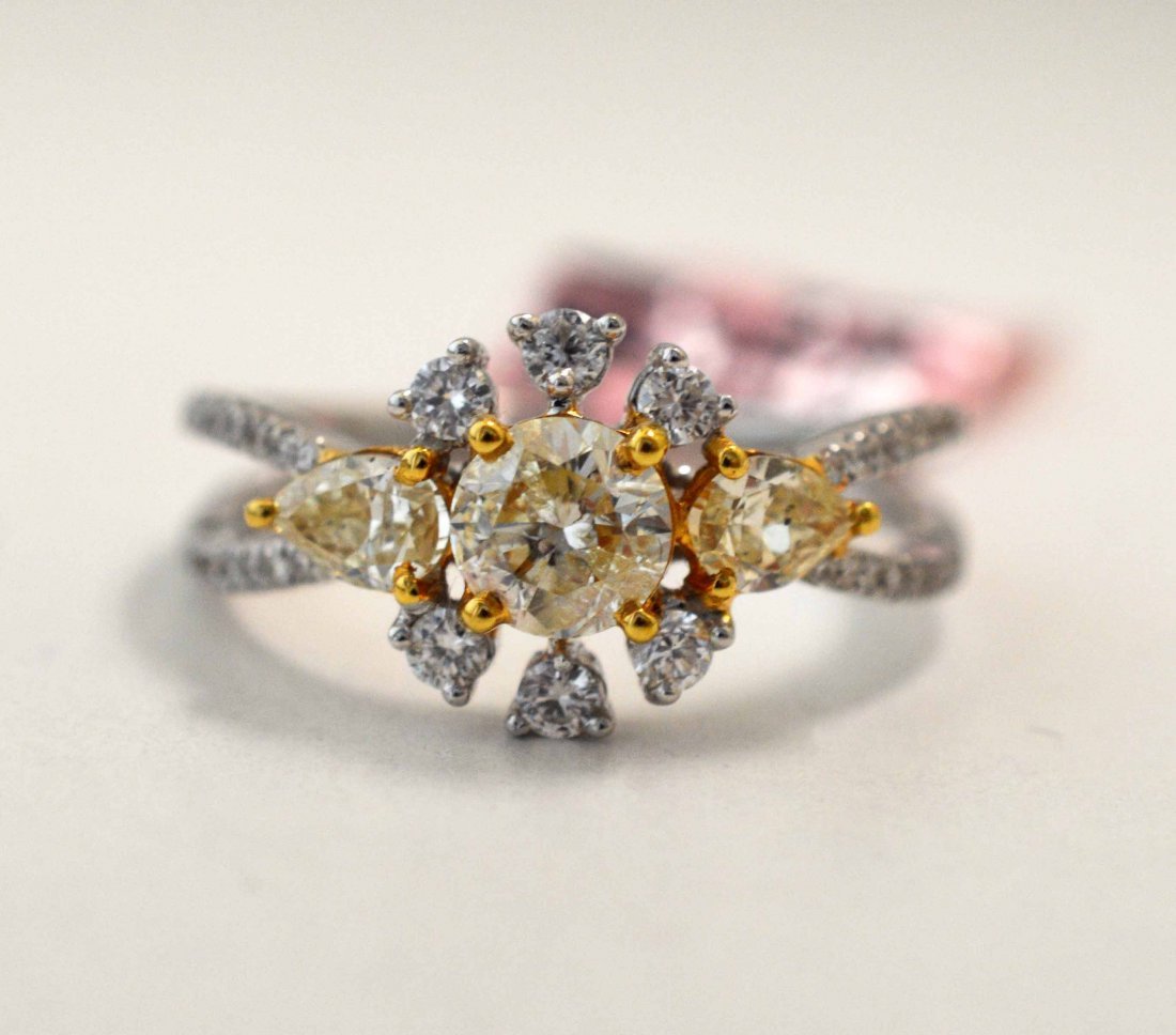 18KT White Gold, 1.31ctw Fancy/White Diamond Ring: 18KT White Gold, 1.31ctw Fancy/White SI2-I1 Diamond Ring. Total Weight of Ring: 4 grams. A4320