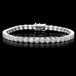 18k White Gold 13.00ct Diamond Tennis Bracelet: 18k White Gold 13.00ct Diamond Tennis Bracelet ****** Metal: 18k Solid White Gold / Size: 7 / Total Item Weight: 15.5 grams / Country Made: USA / / Main Stone: Diamond / Color: White / Carat Total Wei