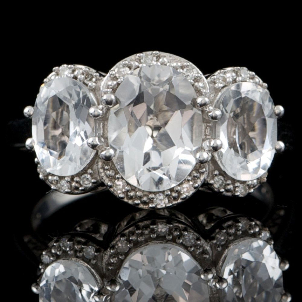 925 Sterling Silver Sapphire 0.006ct Diamond Ring: 925 Sterling Silver Sapphire 0.006ct Diamond Ring ****** Metal: .925, Sterling Silver / Total Item Weight: 4.4 grams / / Main Stone: Sapphire / Color: White / Treatment: Created / Clarity: Type 2 / Cu