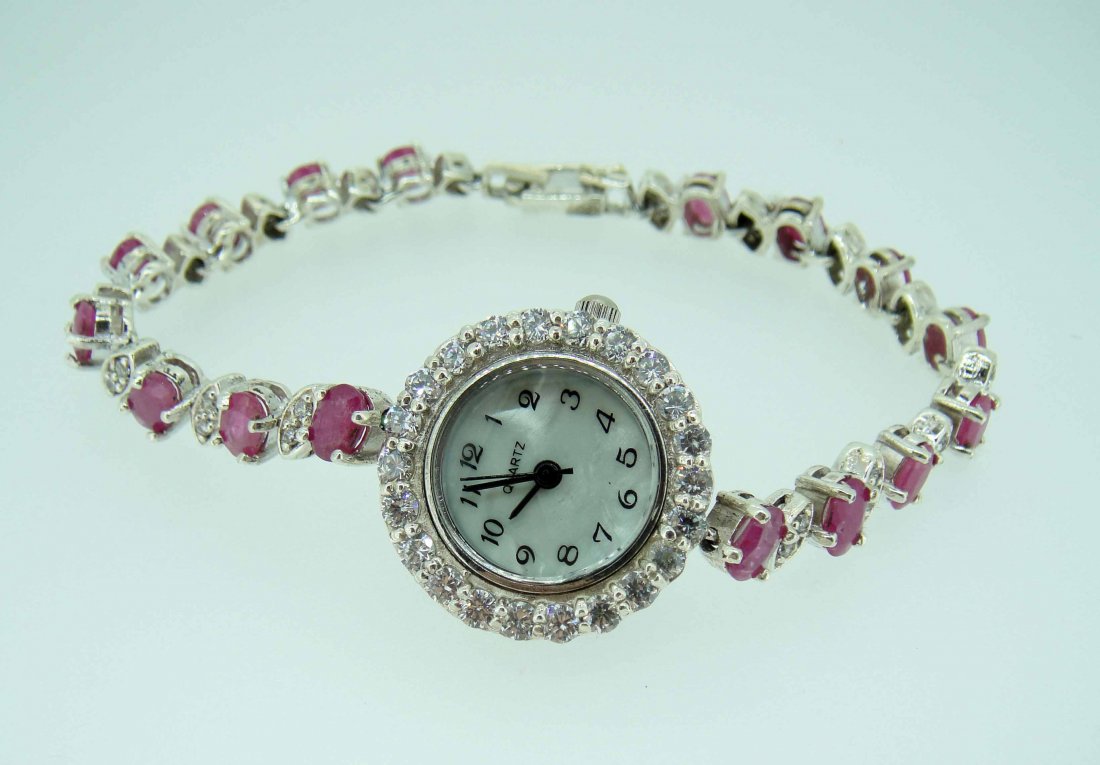 .925 Sterling Silver, 10ct Ruby & 5ct CL-Sapphire Watch: 925 Solid Sterling Silver, 10ct Ruby & 5ct Colorless-Sapphire Wristwatch w/ MOP Dial.