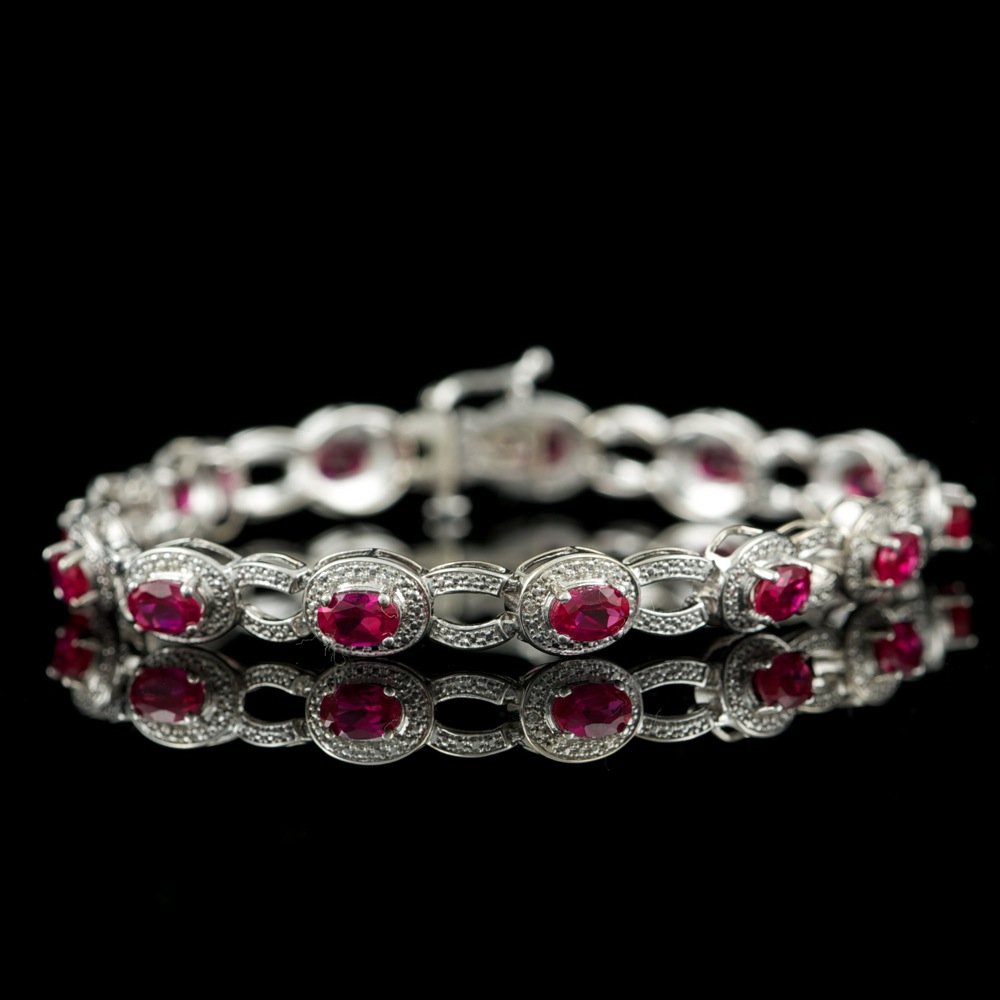 925 Sterling Silver Ct Ruby 0.01ct Dia Bracelet: 925 Sterling Silver Ct Ruby 0.01ct Dia Bracelet ****** Metal: .925, Sterling Silver / Total Item Weight: 13.5 grams / / Main Stone: Ruby / Color: Pink / Treatment: Created / Clarity: Type 2 / Cut: Ver