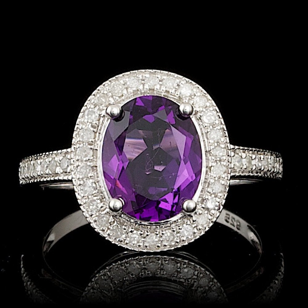 925 Sterling Silver Ct Amethyst Ct Sapphire Ring: 925 Sterling Silver Ct Amethyst Ct Sapphire Ring ****** Metal: .925, Sterling Silver / Total Item Weight: 4.0 grams / / Main Stone: Amethyst / Color: Purple / Clarity: Type 2 / Cut: Very Good / / Seco