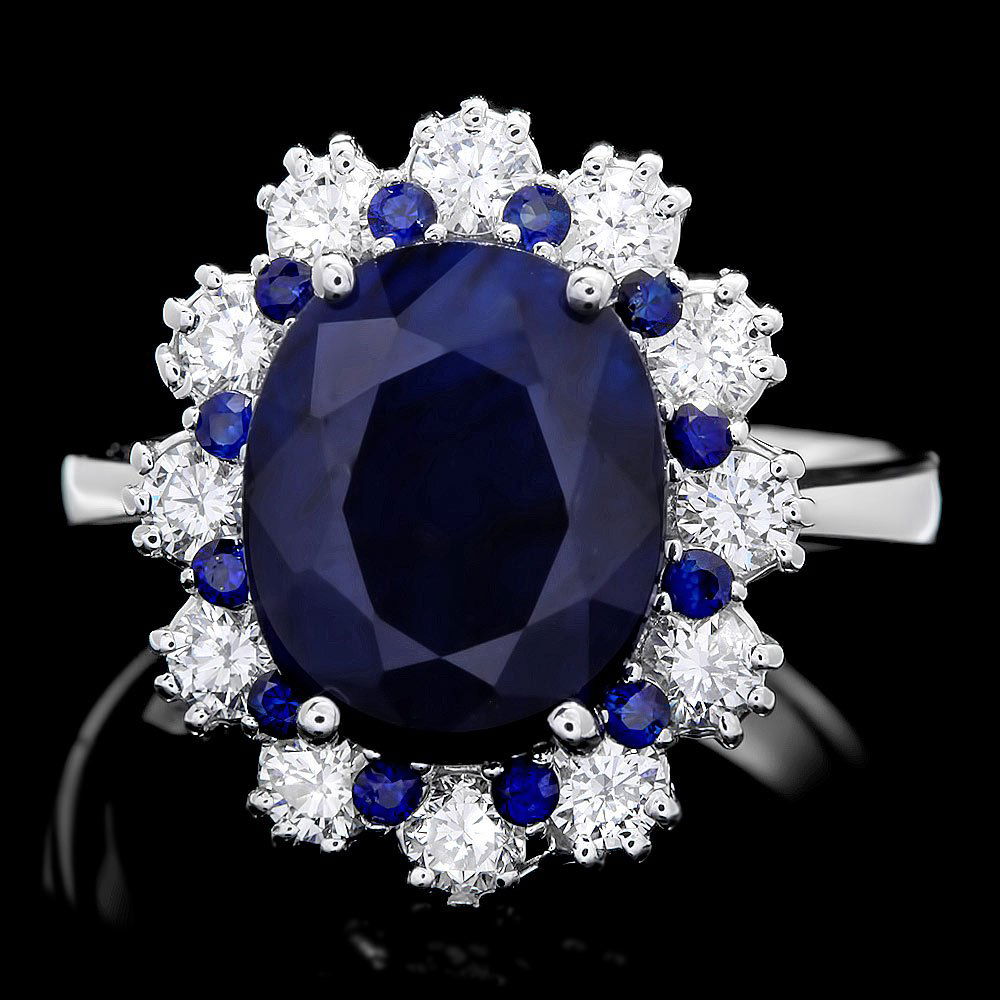 14k White Gold 5.2ct Sapphire 0.90ct Diamond Ring: 14k White Gold 5.2ct Sapphire 0.90ct Diamond Ring ****** Metal: 14k Solid White Gold / Size: 6.75 / Total Item Weight: 6.0 grams / Country Made: USA / / Main Stone: Sapphire / Color: Blue / Carat Tota
