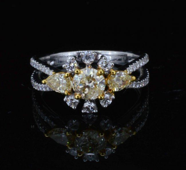18KT White Gold, 1.31ctw Fancy/White Diamond Ring: 18KT White Gold, 1.31ctw Fancy/White SI2-I1 Diamond Ring. Total Weight of Ring: 4 grams. A4320