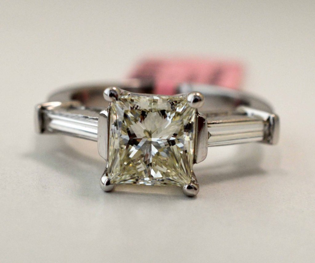 18KT White Gold, 3.54ct Princess Diamond Solitaire Ring: 18KT White Gold, 3.54ct Diamond Solitaire Ring. Center is 3.02ct, VS2/SI1 Clarity, Color: Light Yellow, Cut: Princess. Total Weight of Ring: 7 grams. A41000