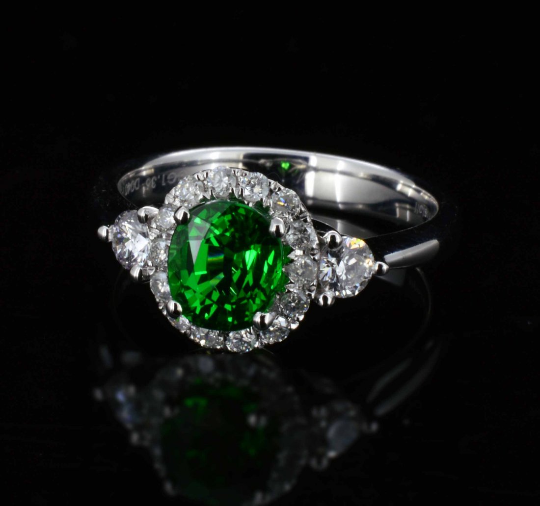 18K White gold, 1.36ct Tsavorite & 0.40ct Diamond Ring: 18K White gold, 1.36ct Tsavorite & 0.40ct Diamond Ring. Total weight of rign : 3.80 grams. Certificate of Appraisal is included. A3840