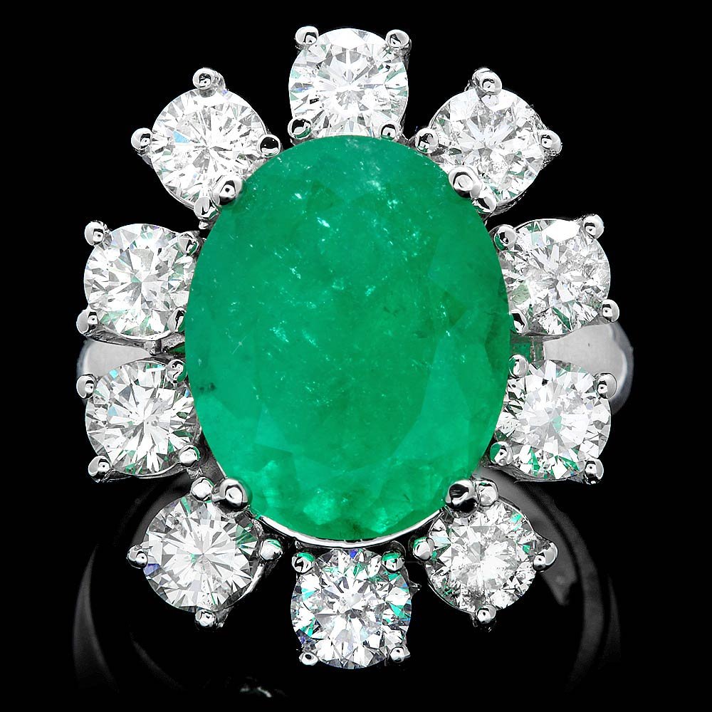 18k White Gold 8.00ct Emerald 3.35ct Diamond Ring: This lovely ladies ring is crafted in solid 18k White Gold and features a 8.00 carat 100% Natural Emerald mined from Colombia + accented with 10 sparkling eye-clean natural Diamonds, totaling 3.35 car