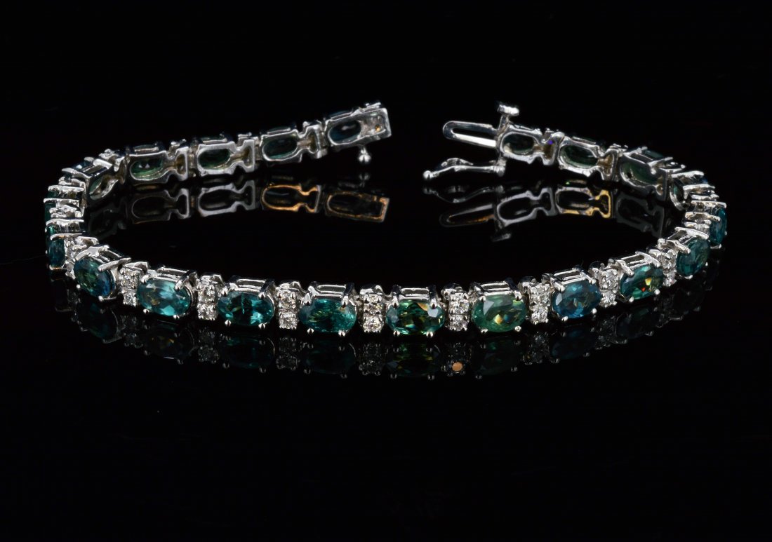 14K Gold, 8.97CT Alexandrite & Diamond Bracelet: 14K Gold, 8.97CT Oval cut Natural Alexandrite & 0.92CT Natural Diamond All VS- SI Clarity, G-H ColorTW: 10.70 GramsA21000N