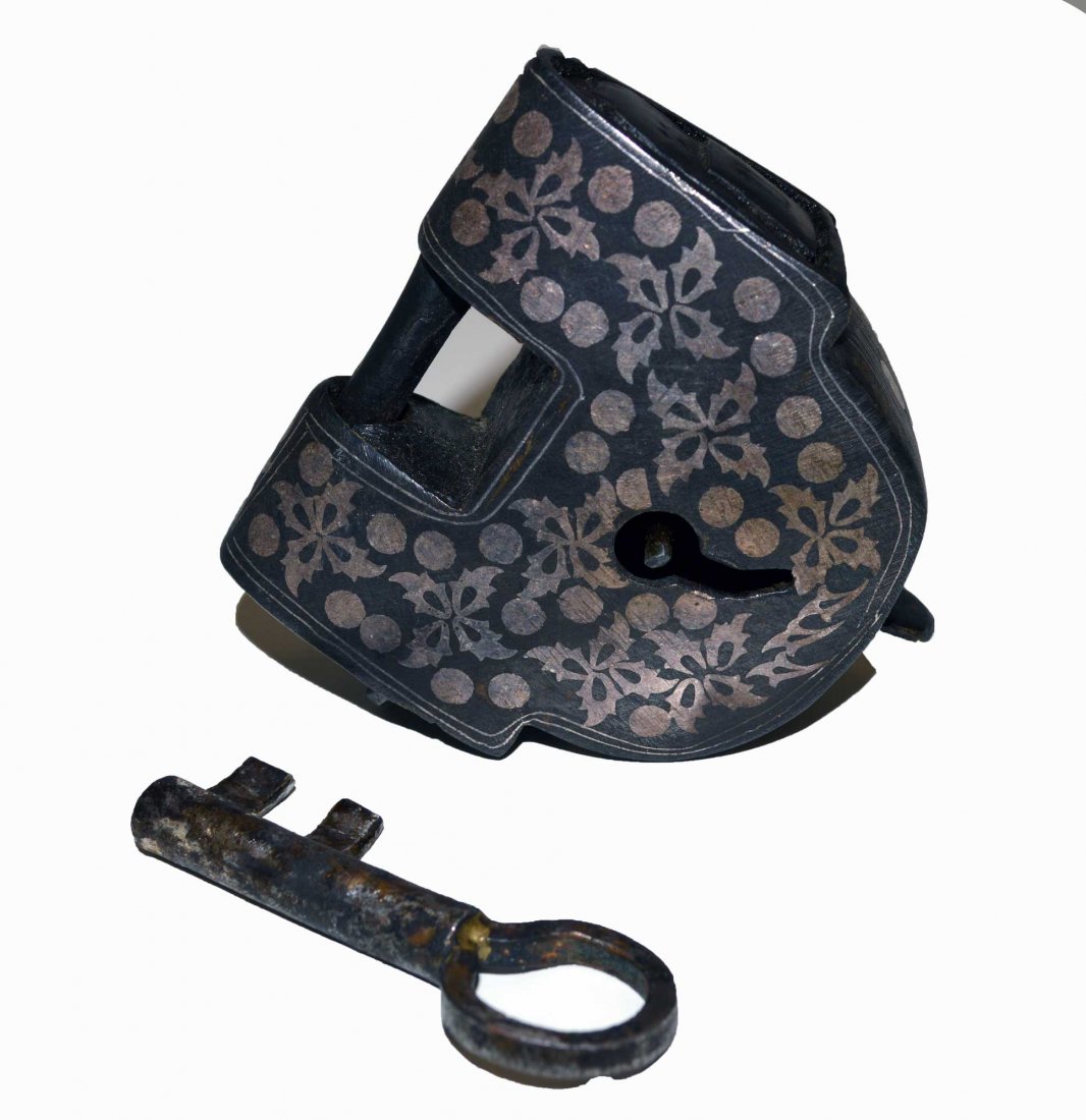 Antique Islamic Silver Inlaid Pad Lock: WAG280Origin: IndiaArtist: Unknown Age: AntiqueSize: 3 x 3 inchesImpression: Silver InlaidMaterials: MetalMarkings: None