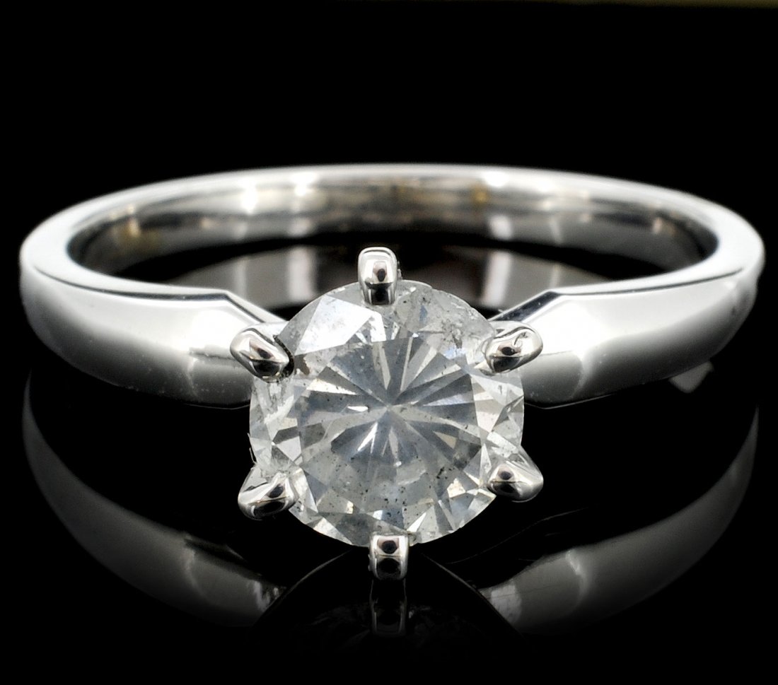 14K White Gold 1.03ct Diamond Solitaire Ring: Estimated Retail Replacement Value: $5,508.00 Ref: WAG2200 Gold Content: 14K White Gold Weight of Item: 2.6 grams Main Gemstone: Natural Diamond Shape: Round Brilliant Weight: 1.03ct Color Grade: K Cl