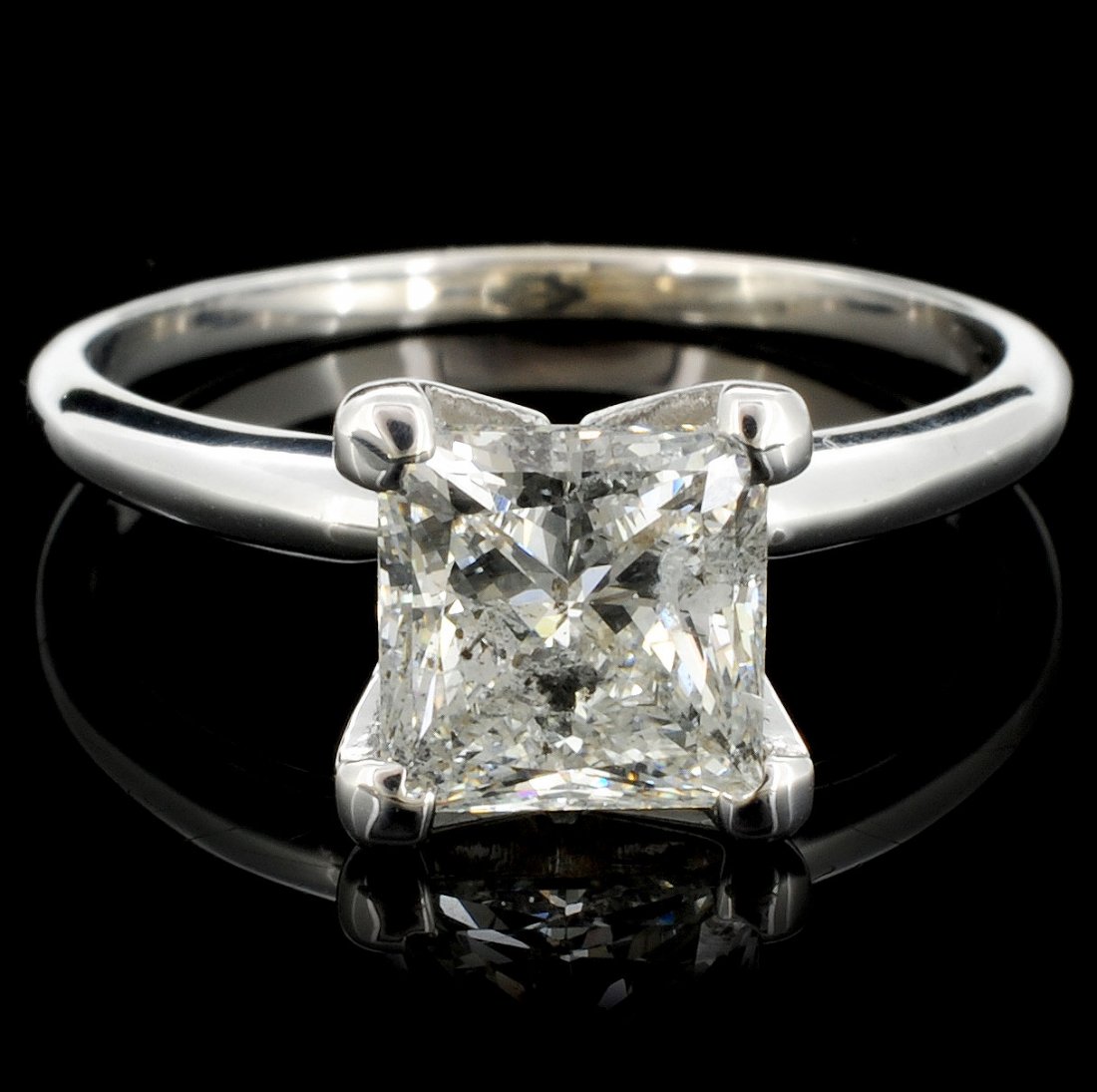14K White Gold 1.52ct Diamond Solitaire Ring: Estimated Retail Replacement Value: $25,068.00 Ref: WAG10024 Gold Content: 14K White Gold Weight of Item: 2.4 grams Main Gemstone: Natural Diamond Quantity: 1 counts Shape: Square Weight: 1.52ct Clari